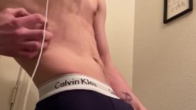 White teen with abs stroking cock