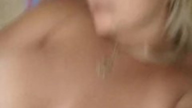 Naked women in bed. Relaxing in evening