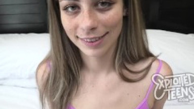 This video features a petite 18 yr old with green eyes and freckles