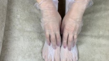 Female doctor seduced patient and performed footjob in white stockings and handjob in medical gloves